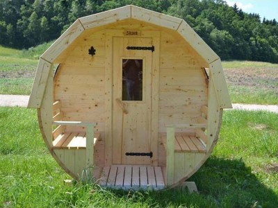 Wooden barrel sauna.